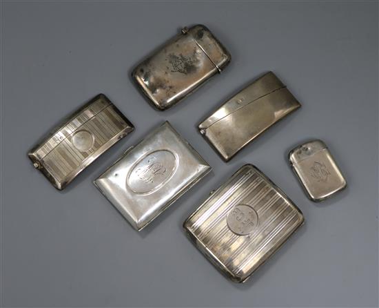 Three silver cigarette cases, a silver vesta case and two silver card cases.